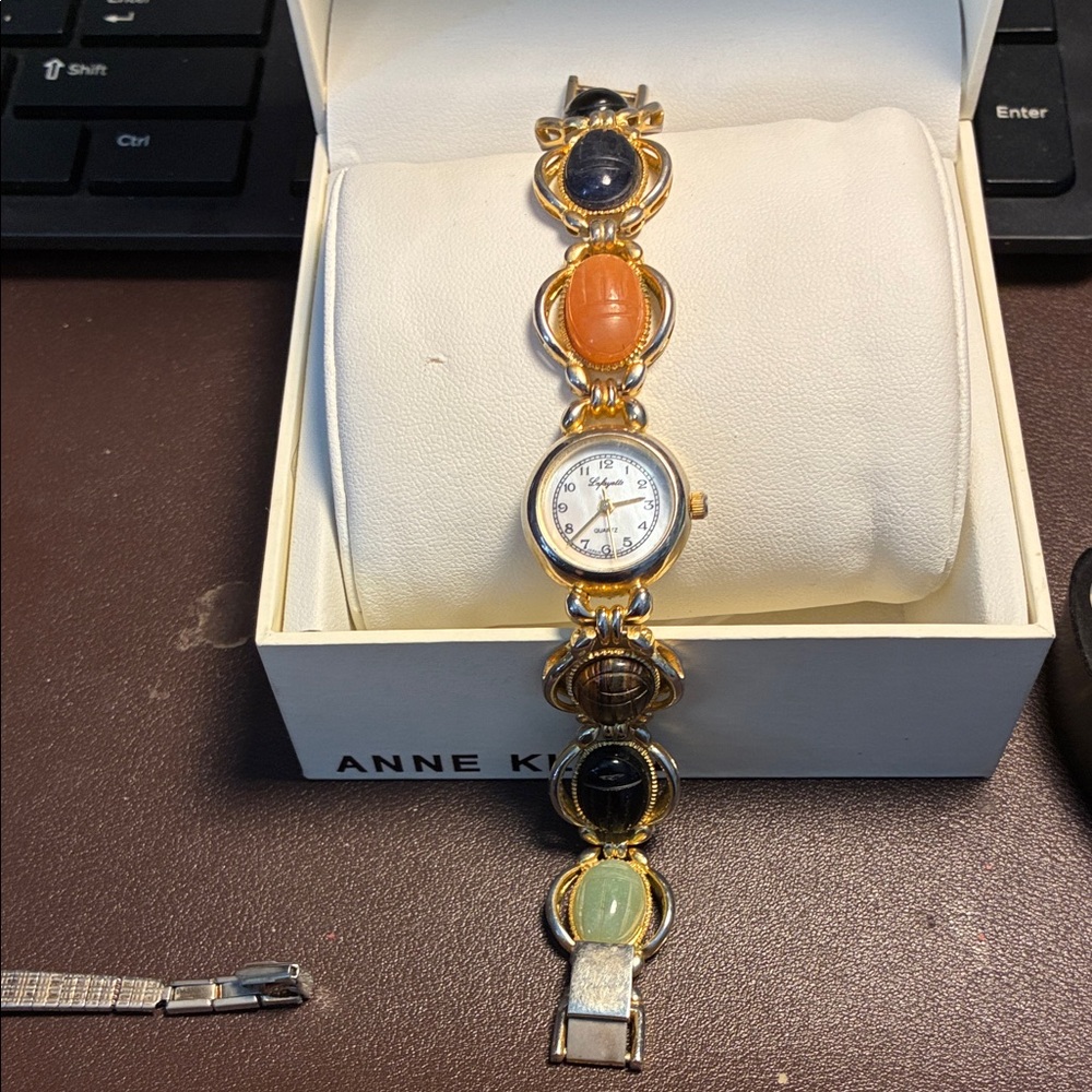 Anne Klein Gold Watch with Colorful Stones